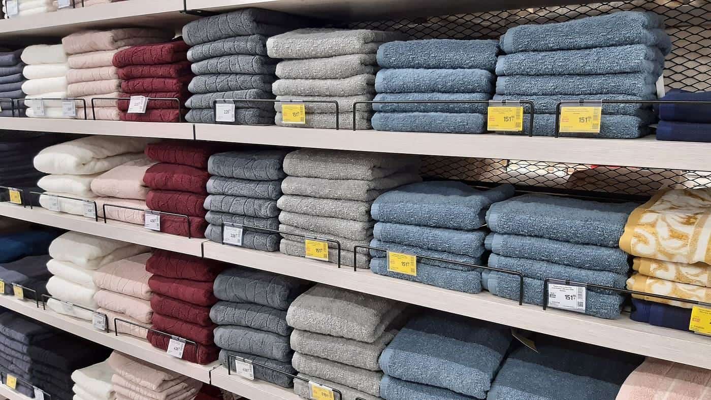 Folded towels on shelves